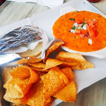 Hecho En Oak Park - Queso fundido con chorizo ($7.50) comes with chips and tortillas. Tastes fine and a bit spicy, but it looks awful (like barf)  :'( - Mexican Near Me - Oak Park, Illinois
