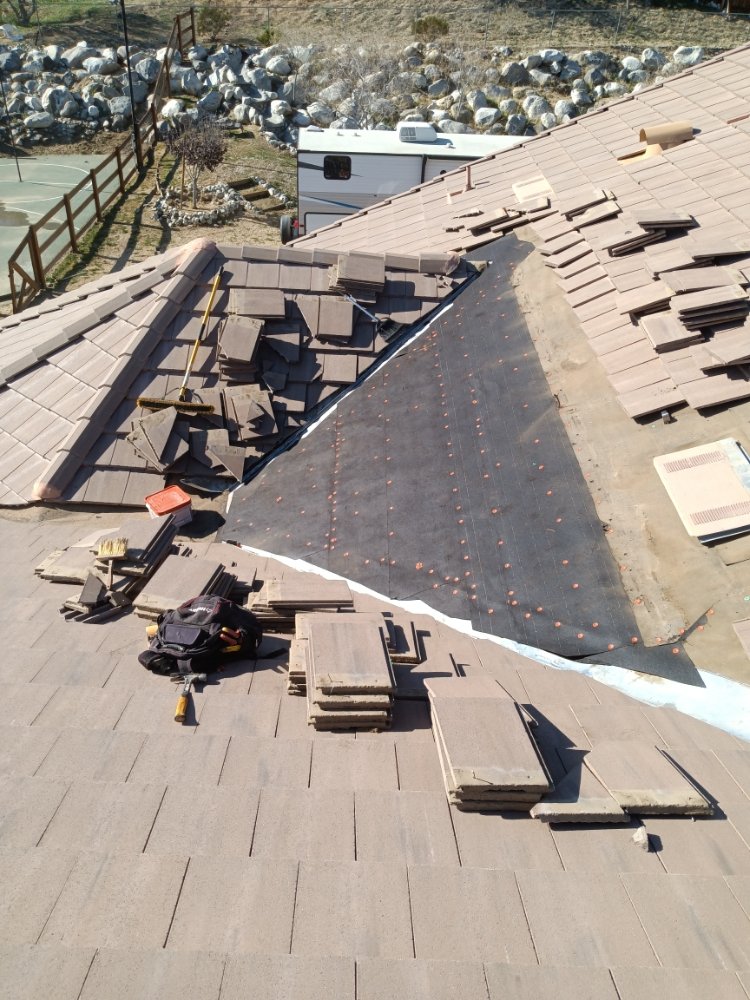 Slide of Moses Roofing