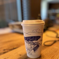 The Fly-By - Mystery drink in soy ink, compostable, cafe branded cup