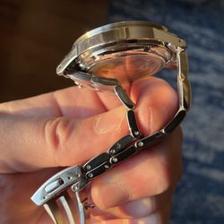 Gary J Long Jewelers - You can see the tool mark on the right side of the first link on the bottom and the left side, adjacent to the pin hole on the top link.