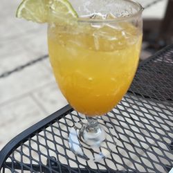 The 3 Amigos Mexican Restaurant - White Sparkling Sangria  Loved this! Tastes like mango-very refreshing. Try this!