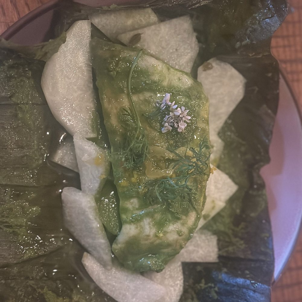 Duo’s - Kampechi pescado-a mild white, flaky fish, steamed in a banana leaf, over potatoes-reminiscent of a sea bass/thin halibut. It's delicious. - Tacos Near Me - Pittsburgh, Pennsylvania Duo’s - Kampechi pescado-a mild white, flaky fish, steamed in a banana leaf, over potatoes-reminiscent of a sea bass/thin halibut. It's delicious. - Tacos Near Me - Pittsburgh, Pennsylvania