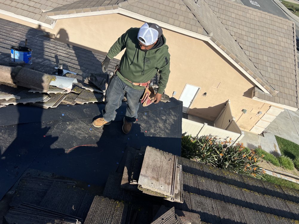 Slide of Heritage Roofing Solutions