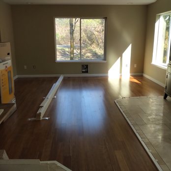 Universal Guys - Installed the same bamboo floor and trim throughout the great room. Looks like a whole different house, can't wait to see the end result! - General Contractors Near Me Universal Guys - Installed the same bamboo floor and trim throughout the great room. Looks like a whole different house, can't wait to see the end result! - General Contractors Near Me