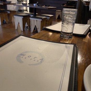 Mora - Oak Park - a menu and a glass of water - Asian Fusion Near Me - Oak Park, Illinois