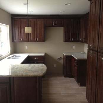 Stone Depot & More - Rental property kitchen with ceramic wood plank floors - Cabinetry Near Me - Carlsbad, California
