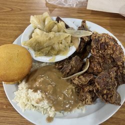 Livers, cabbage and rice and gravy with a side of cornbread. They know how to cook chicken livers. Moist but done. Delicious!