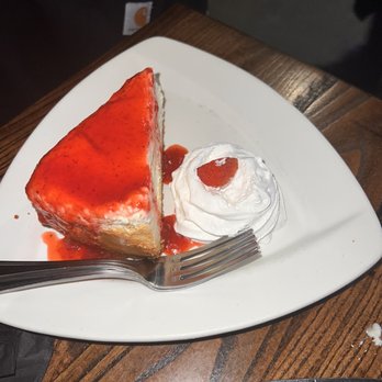 Local Goat - NY Cheesecake with Strawberry Coulis - New American Near Me - Pigeon Forge, Tennessee