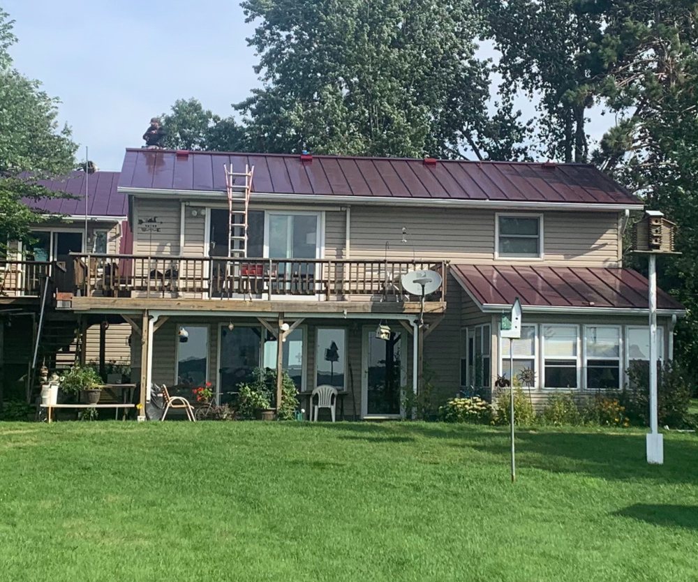 Slide of Lion Roofing and Contracting