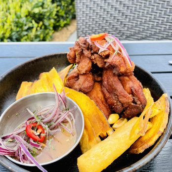 Limón - Chicharron de pollo - crispy chicken marinated in Aji Amarillo soy sauce - Peruvian Near Me - Oakland, California