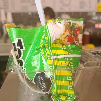 Oasis Raspados - a plastic container of chips and a plastic spoon - Ice Cream & Frozen Yogurt Near Me - Phoenix, Arizona