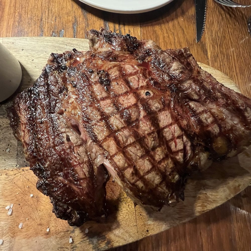 Cuisine & Wine Bistro - Bone-in ribeye - Wine Bars Near Me - Chandler, Arizona