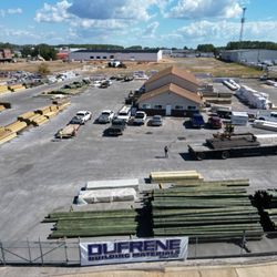 Dufrene Building Materials - View of our lumberyard and hardware store in Pensacola, FL with roofing and building supplies - Dufrene Building Materials