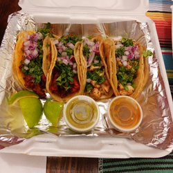 Nacho’s Tacos - 2 chicken mini tacos. 2 pork mini tacos.