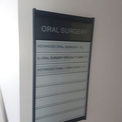 A+ Oral Surgery Specialty Care, P.C. - The sign by the door