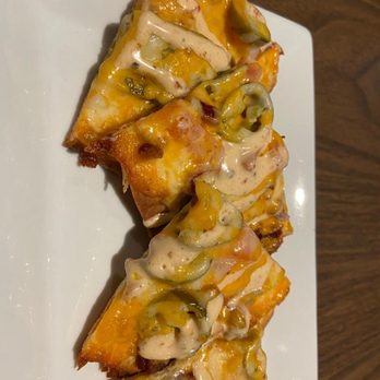 Muddy Water Hotel - Spicy bacon and cheese flatbread - Salad Near Me - Beeton, Ontario Muddy Water Hotel - Spicy bacon and cheese flatbread - Salad Near Me - Beeton, Ontario