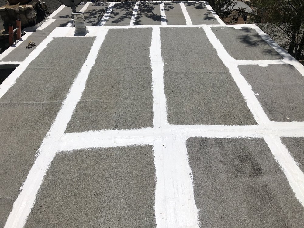 Slide of Costa Roofing