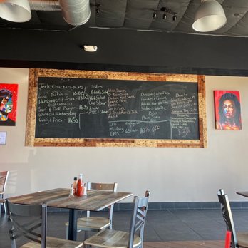 Janet & Ray's - Menu on the wall changes daily - Caribbean Near Me - Tucson, Arizona
