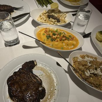Eddie V's Prime Seafood - 22 oz USDA Prime Bone-In Ribeye with yummy sides - Seafood Near Me - Plano, Texas Eddie V's Prime Seafood - 22 oz USDA Prime Bone-In Ribeye with yummy sides - Seafood Near Me - Plano, Texas