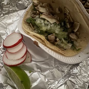 Mexican Grill - a taco and sliced radishes - Mexican Near Me - New York, New York Mexican Grill - a taco and sliced radishes - Mexican Near Me - New York, New York