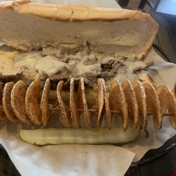 RelicRoad Brewing - Philly Cheese Steak (meat and provolone cheese only) spiral potato and pickle spear - Breweries Near Me - Winslow, Arizona RelicRoad Brewing - Philly Cheese Steak (meat and provolone cheese only) spiral potato and pickle spear - Breweries Near Me - Winslow, Arizona