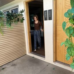 Door to room in secluded outdoor hallway