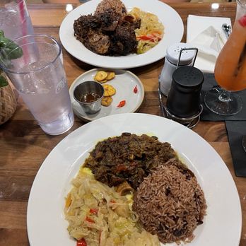 Island Soul Kitchen - Goat curry and oxtail, both served the cabbage and rice and beans during their soft opening - Soul Food Near Me - Sacramento, California