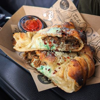 Nadi Plates - Best Calzone of my life. Popeye. Italian sausage, spinach & ricotta. - Food Trucks Near Me