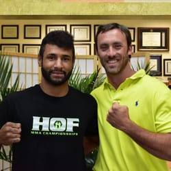 New Smyrna Spine & Injury Center - Dr. Walsh, New Smyrna Beach Chiropractor, with Mike Davis, professional MMA fighter.