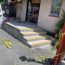Torres Concrete - New landing with steps on one side and Ada ramp on other side.