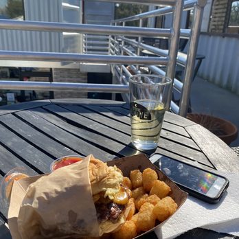 Mess Hall - Samburger with a Bold Rock cider on the outside top deck - Burgers Near Me - Wilmington, North Carolina