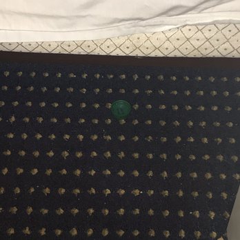 Sandcastle Motel - Bottle cap, old French fry, hairy bed sheets, and stain on desk. - Hotels Near Me - Rehoboth Beach, Delaware Sandcastle Motel - Bottle cap, old French fry, hairy bed sheets, and stain on desk. - Hotels Near Me - Rehoboth Beach, Delaware