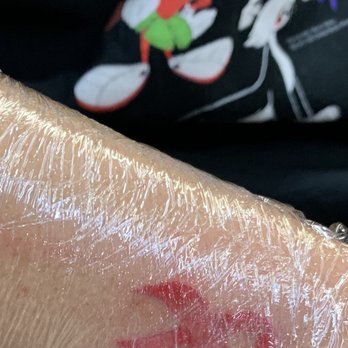 Buena Vida Tattoo - Breast cancer ribbon (red and pink) - Piercing Near Me - Los Angeles, California
