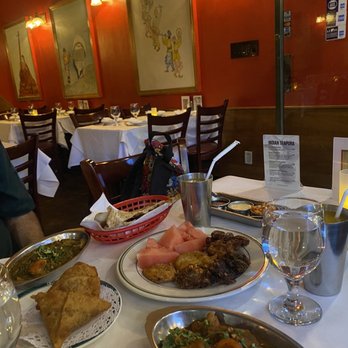 Indian Tanpura - a table of food and drinks - Indian Near Me - New York, New York Indian Tanpura - a table of food and drinks - Indian Near Me - New York, New York