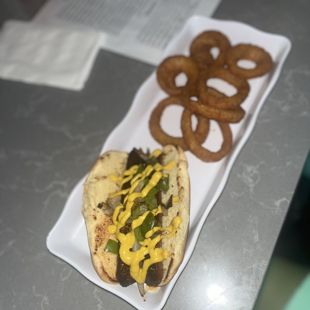 MY hot sausage and onion rings were bomb. The lumpia too. MY hot sausage and onion rings were bomb. The lumpia too.