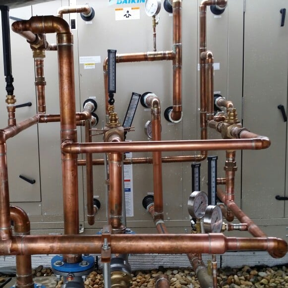 Slide of SJ Plumbing and Mechanical Building Services