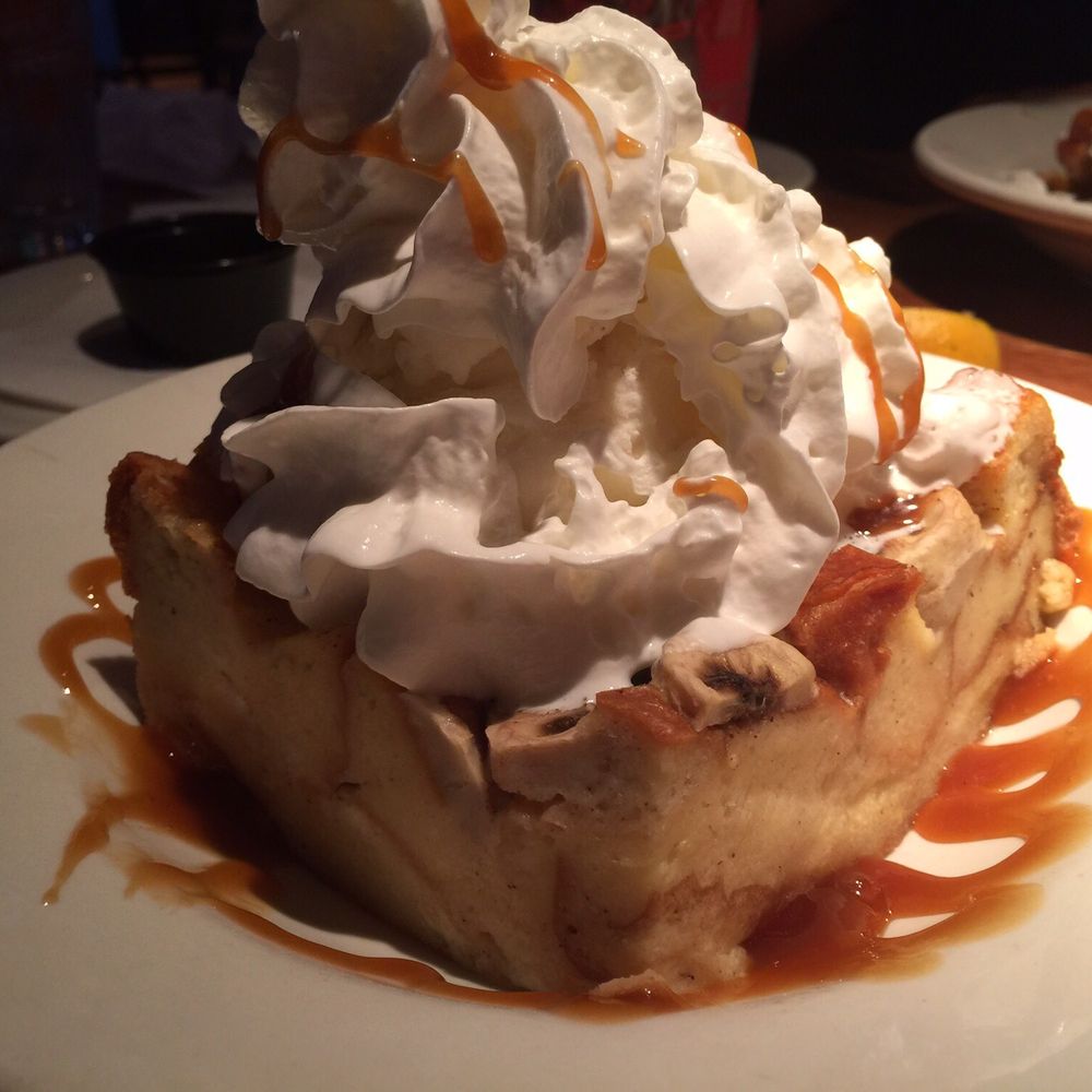 Glory Days Grill - Banana bread pudding with ice cream and whip cream. That is a full size plate in the picture. A meal in itself. - American Near Me - Ranson, West Virginia Glory Days Grill - Banana bread pudding with ice cream and whip cream. That is a full size plate in the picture. A meal in itself. - American Near Me - Ranson, West Virginia