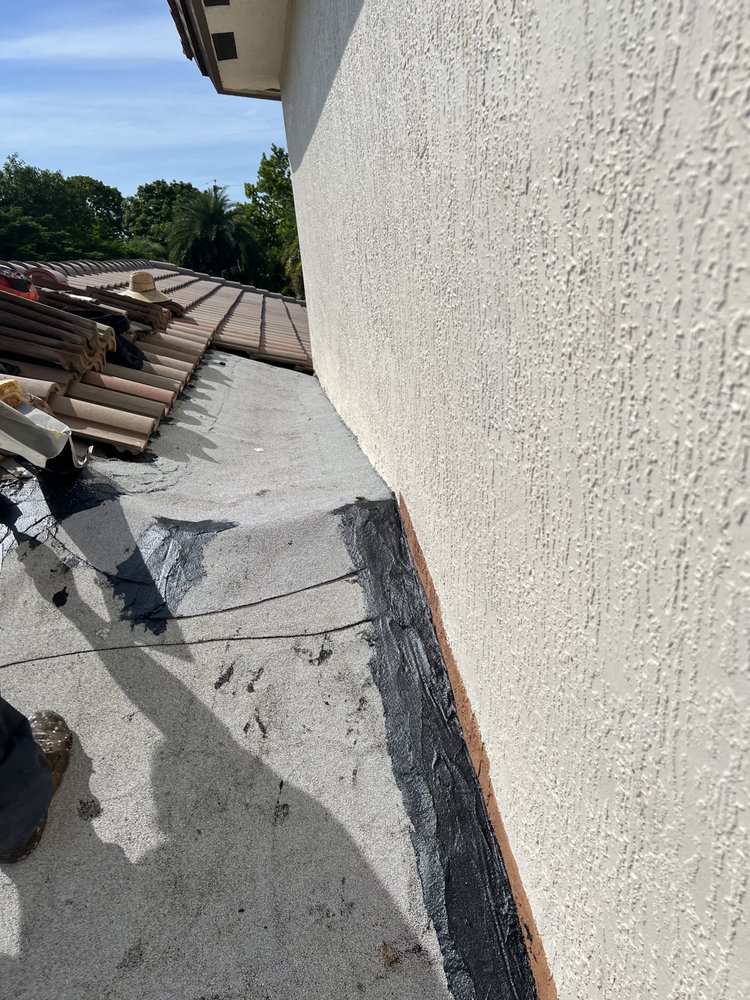 Slide of Borja Roofing