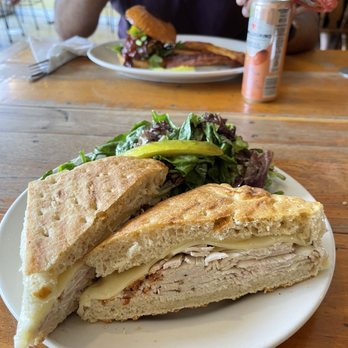 3 Squares Cafe - Turkey and Swiss panino (bacon was on the side) and fried chicken sandwich in the background - Breakfast & Brunch Near Me - Vergennes, Vermont