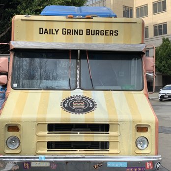 Daily Grind Burgers - a truck parked on the side of the road - Food Trucks Near Me