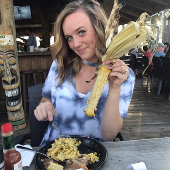 Keith's Oyster Bar - Beautiful girl with Street Corn - Seafood Near Me - Cocoa Beach, Florida Keith's Oyster Bar - Beautiful girl with Street Corn - Seafood Near Me - Cocoa Beach, Florida