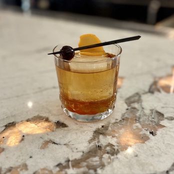 The Embers - Old Smokey (old fashioned with house smoked maple syrup and a charred orange peel) - Cocktail Bars Near Me - Blowing Rock, North Carolina The Embers - Old Smokey (old fashioned with house smoked maple syrup and a charred orange peel) - Cocktail Bars Near Me - Blowing Rock, North Carolina