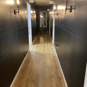 Roots Salon and Wellness - Hallway with suites for the Spa services - Hair Salons Near Me - Cary, North Carolina Roots Salon and Wellness - Hallway with suites for the Spa services - Hair Salons Near Me - Cary, North Carolina