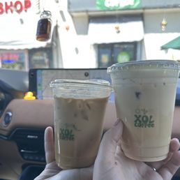 Iced Honey Cinnamon latte with oat milk, iced coconut latte, breve with delicious cold foam and shredded coconut on top.