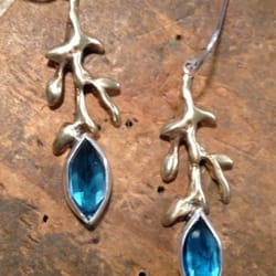 Kate Sydney Jewelry - London blue topaz set with sterling on brass branches.