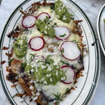 El Molino Central - Nachos verdes w/black beans, sour cream, cheese, guacamole & sliced radish. Best Nachos ever! - Mexican Near Me - Sonoma, California El Molino Central - Nachos verdes w/black beans, sour cream, cheese, guacamole & sliced radish. Best Nachos ever! - Mexican Near Me - Sonoma, California