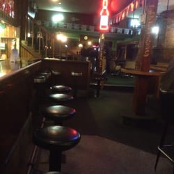 Long Branch Saloon Opry House & Ballroom - Saddle seat at the end of the bar.