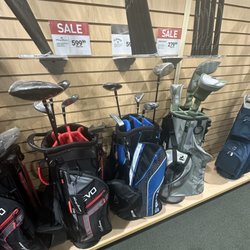 Golf Galaxy - Half of club sets in rear of store