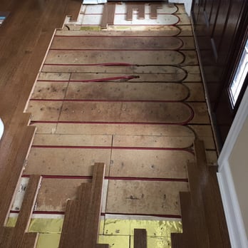 First Class Wood Flooring - Water damaged entry - Flooring Near Me - Selden, New York