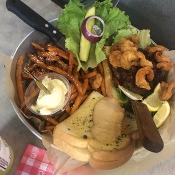 Sanford's Grub & Pub - Shrimp Burger with grilled cheese bun and sweet potato fries - Pubs Near Me - Casper, Wyoming Sanford's Grub & Pub - Shrimp Burger with grilled cheese bun and sweet potato fries - Pubs Near Me - Casper, Wyoming